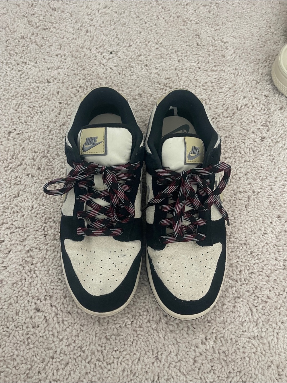 Nike Black and Cream Low-Top Sneakers with Red-Accented Laces